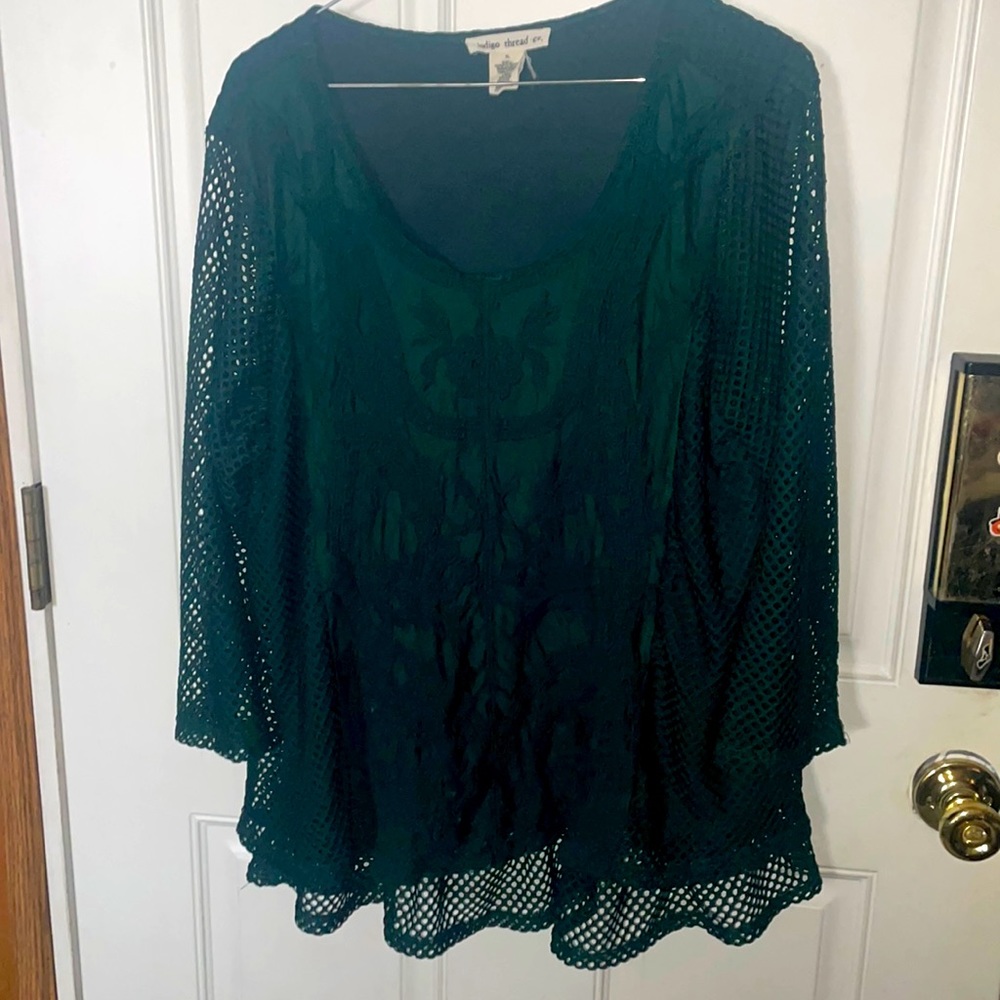 Forrest Green Blouse with mesh sleeves, lacy front, and flare out at hips